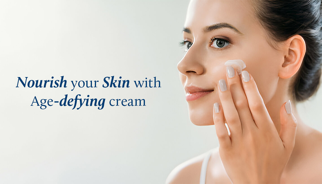 lady is applying anti aging cream